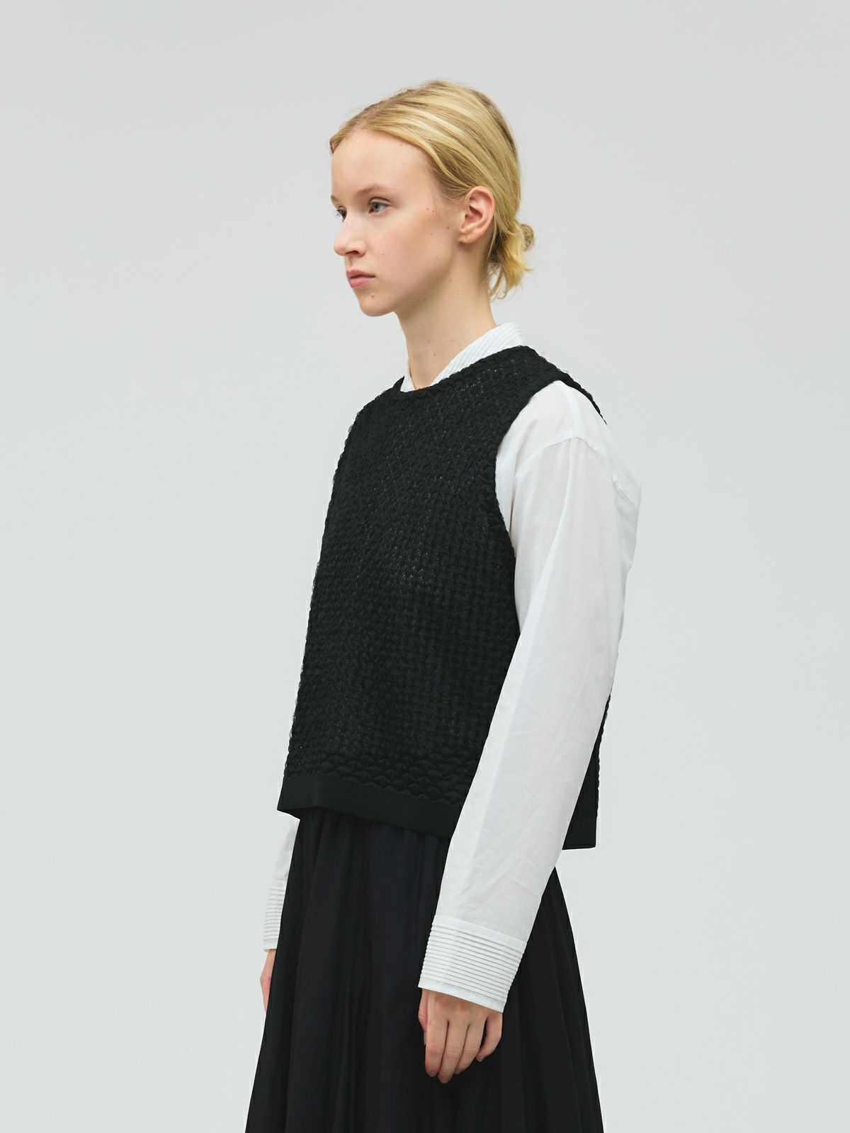 patterned sheer vest detail